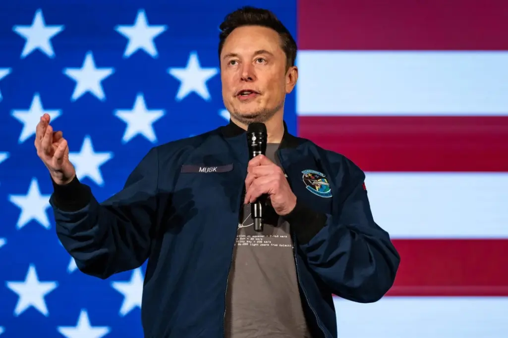 Elon Musk speaking at a business conference